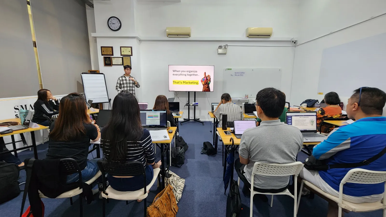 A second angle of Tom Chang Thawat teaching a live Drealm content and AI training session