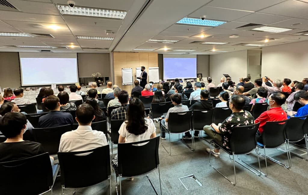 Tom on Stage speaking